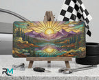 sunrise mountain lake scenic vanity plate on tire — warm gold purple mountain scenic front license plate