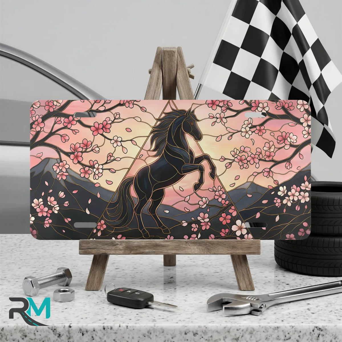 black unicorn vanity plate on display stand — midnight black unicorn cherry blossom aluminum plate