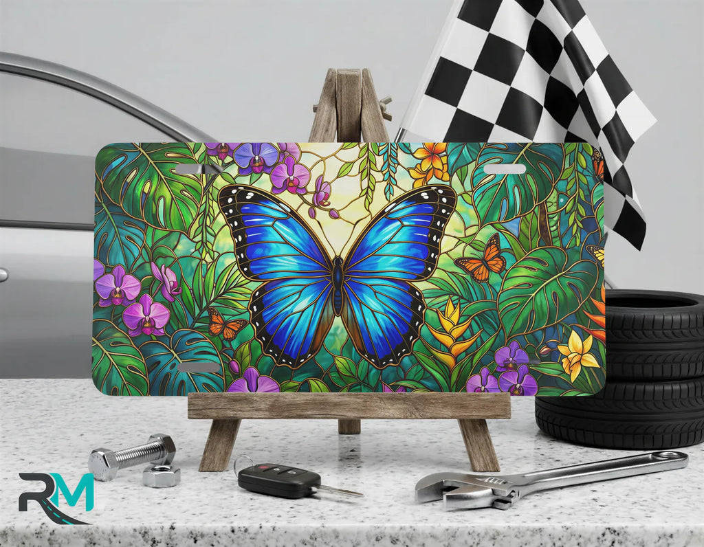 blue butterfly vanity plate on display stand — vivid sapphire blue butterfly tropical aluminum plate