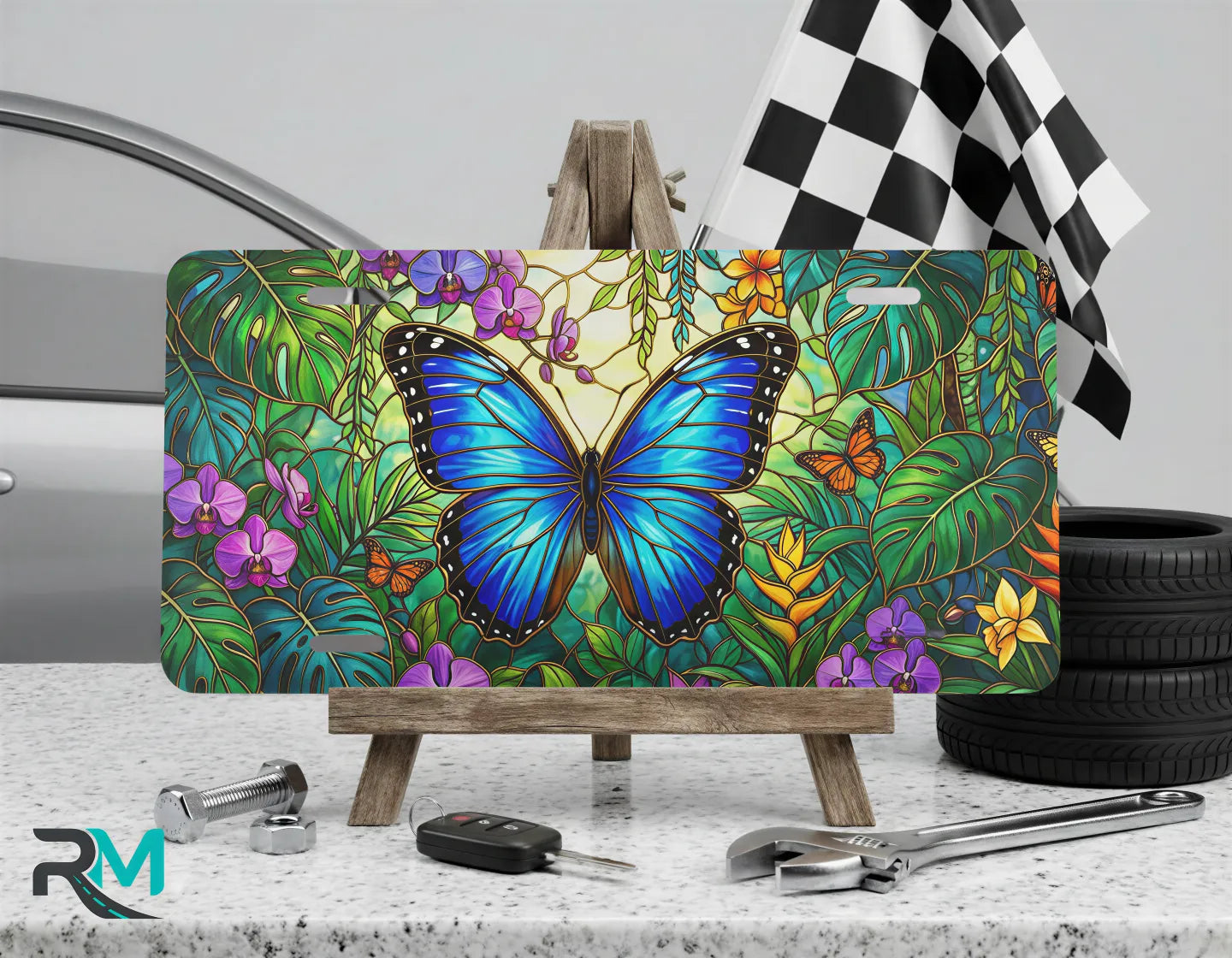 blue butterfly vanity plate on display stand — vivid sapphire blue butterfly tropical aluminum plate