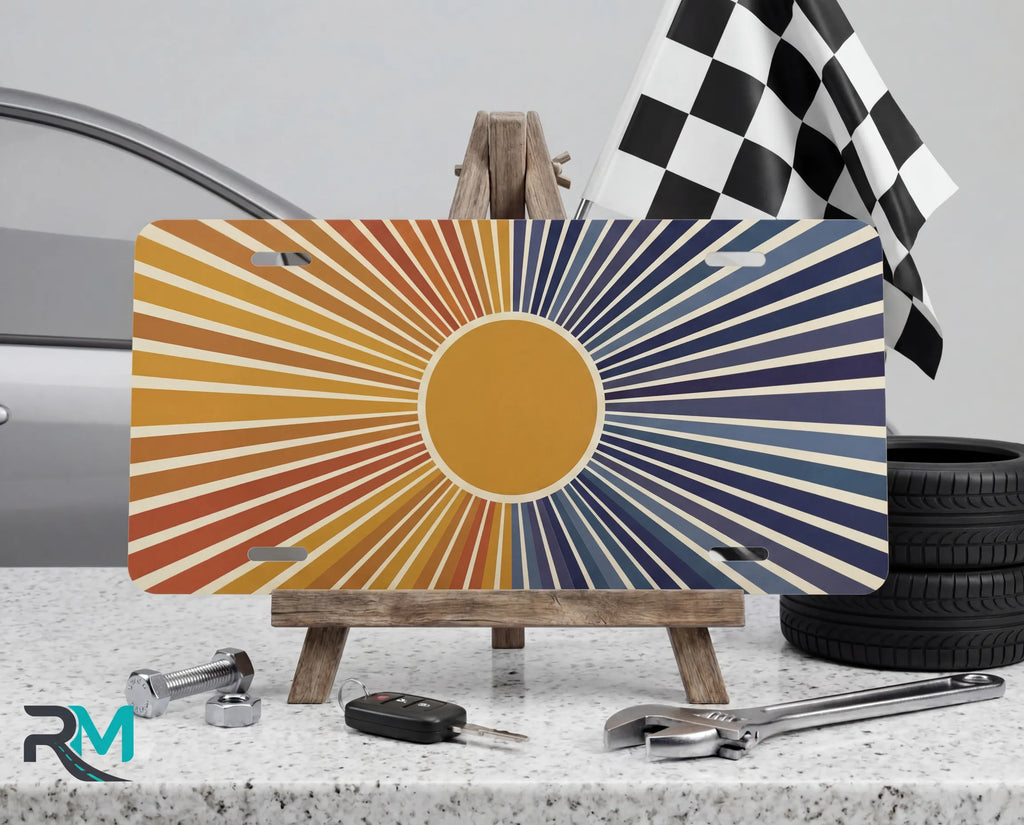 indigo sunrise vanity plate on display stand — bold amber indigo retro aluminum plate