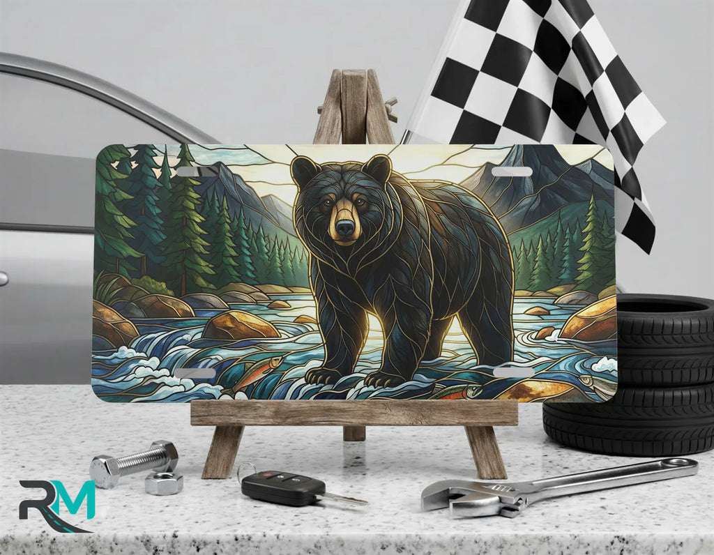 mountain bear vanity plate on display stand — forest green river blue bear aluminum plate