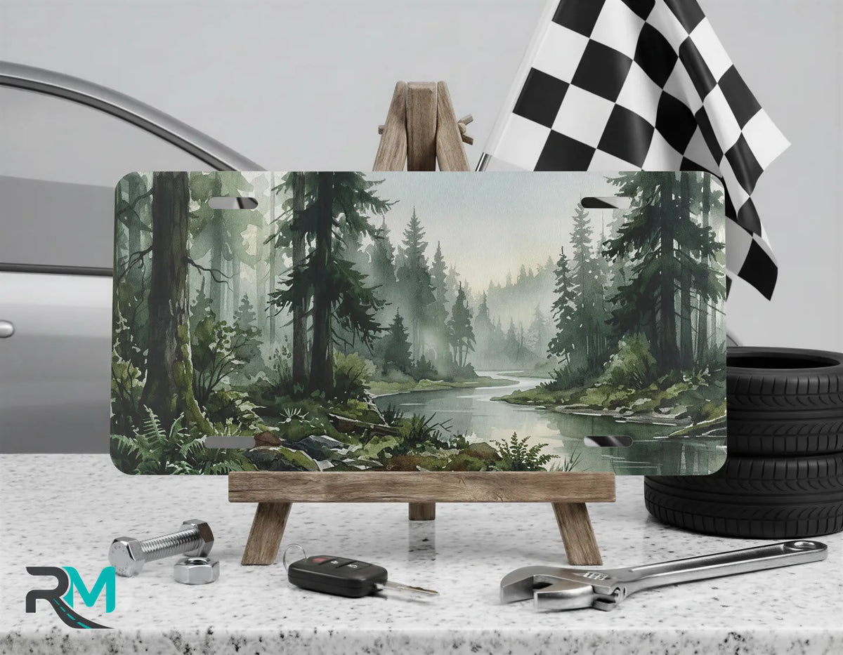 forest river vanity plate on display stand — muted green moss foggy blue license plate