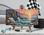 sunset ocean waves vanity plate on display stand — warm gold jewel teal sunrise ocean aluminum plate
