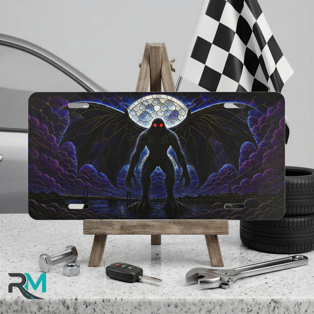 mothman vanity plate on display stand — deep purple winged mothman red eyes aluminum plate