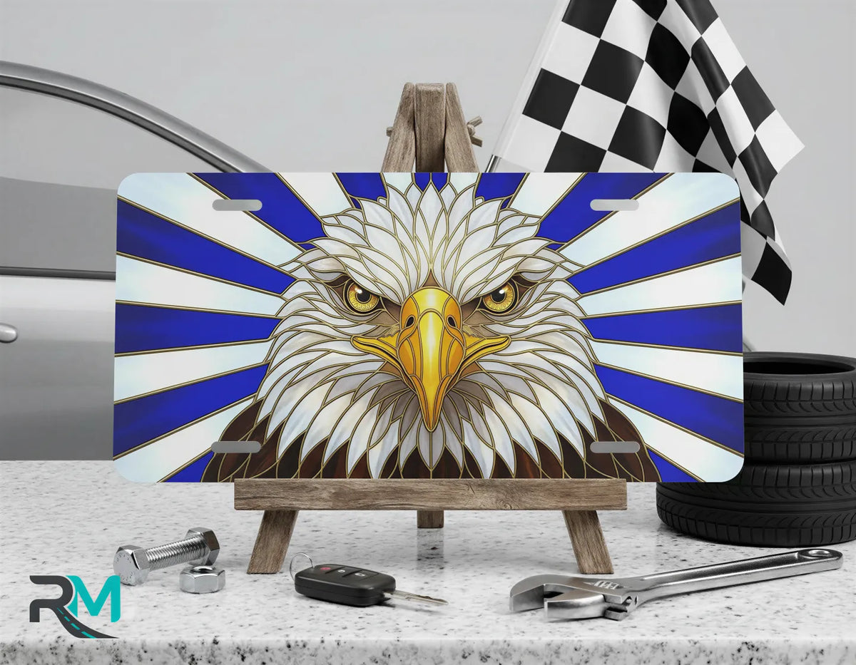 bald eagle vanity plate on display stand — deep navy white patriotic eagle aluminum plate