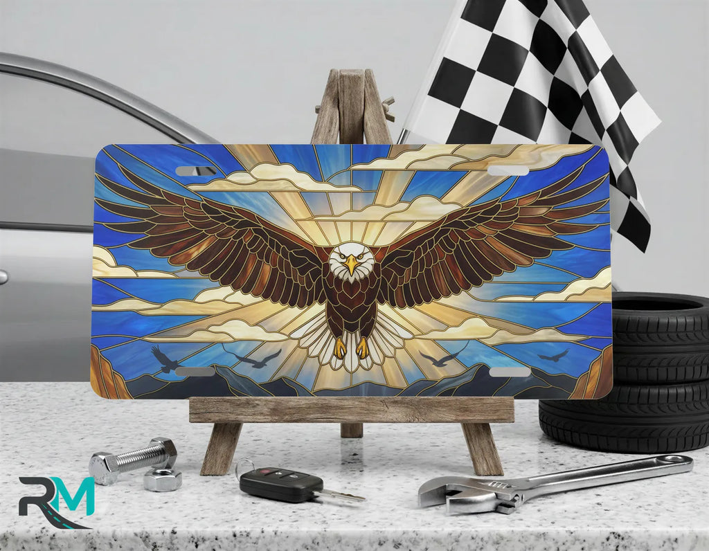 stained glass eagle vanity plate on display stand — cobalt gold soaring eagle aluminum plate