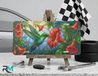 hummingbird hibiscus vanity plate on display stand — vivid red tropical bird aluminum plate