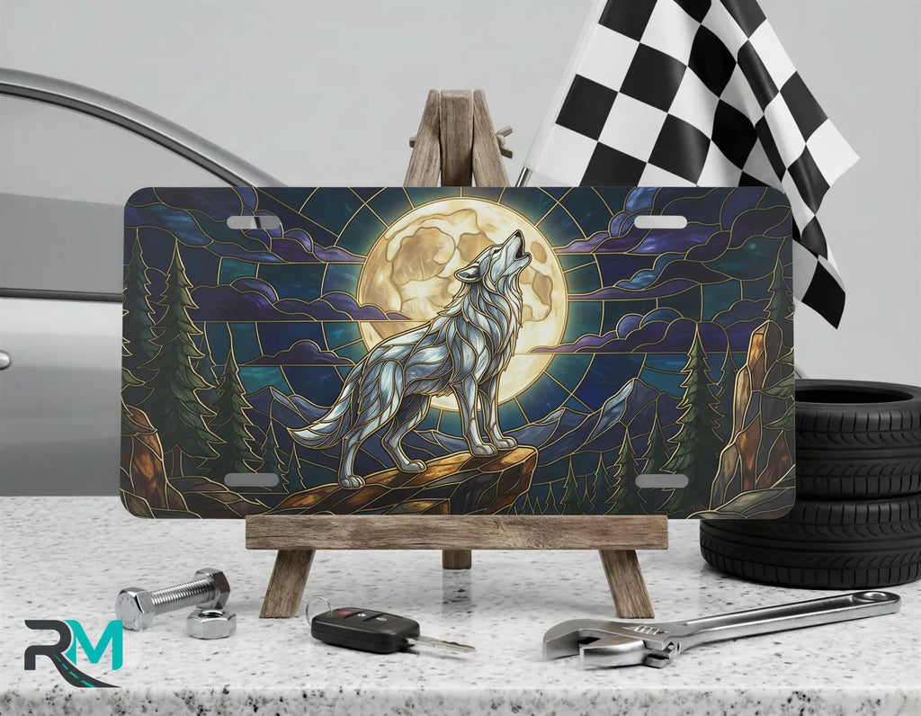 howling wolf vanity plate on display stand — midnight blue gold moon wolf aluminum plate