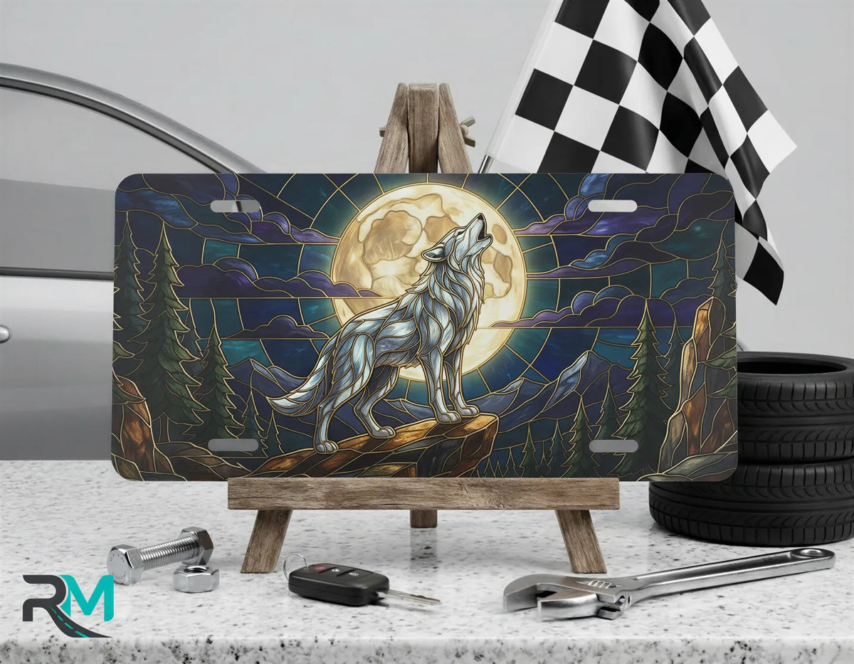 howling wolf vanity plate on display stand — midnight blue gold moon wolf aluminum plate
