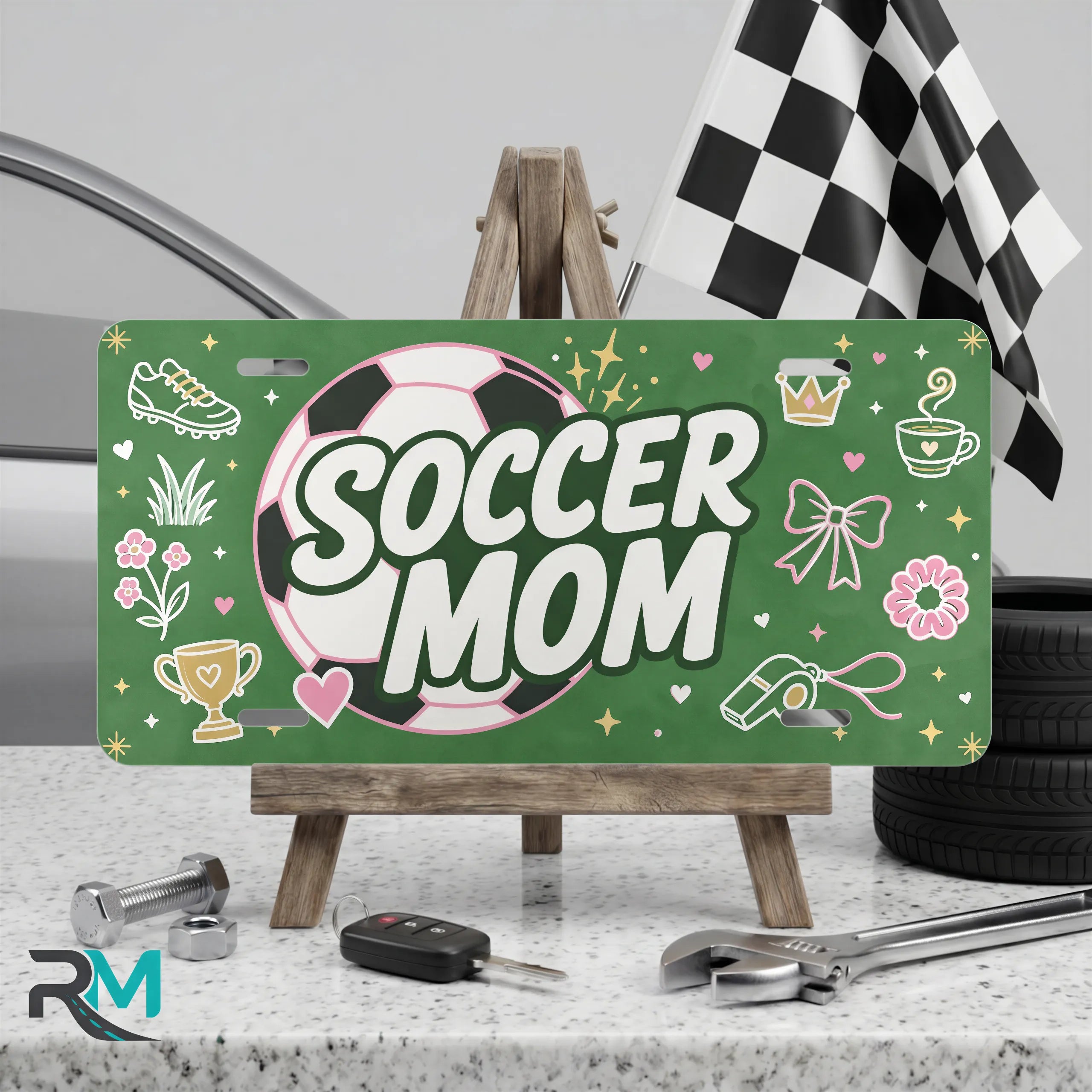 soccer mom vanity plate on display stand — pink soccer ball green aluminum plate