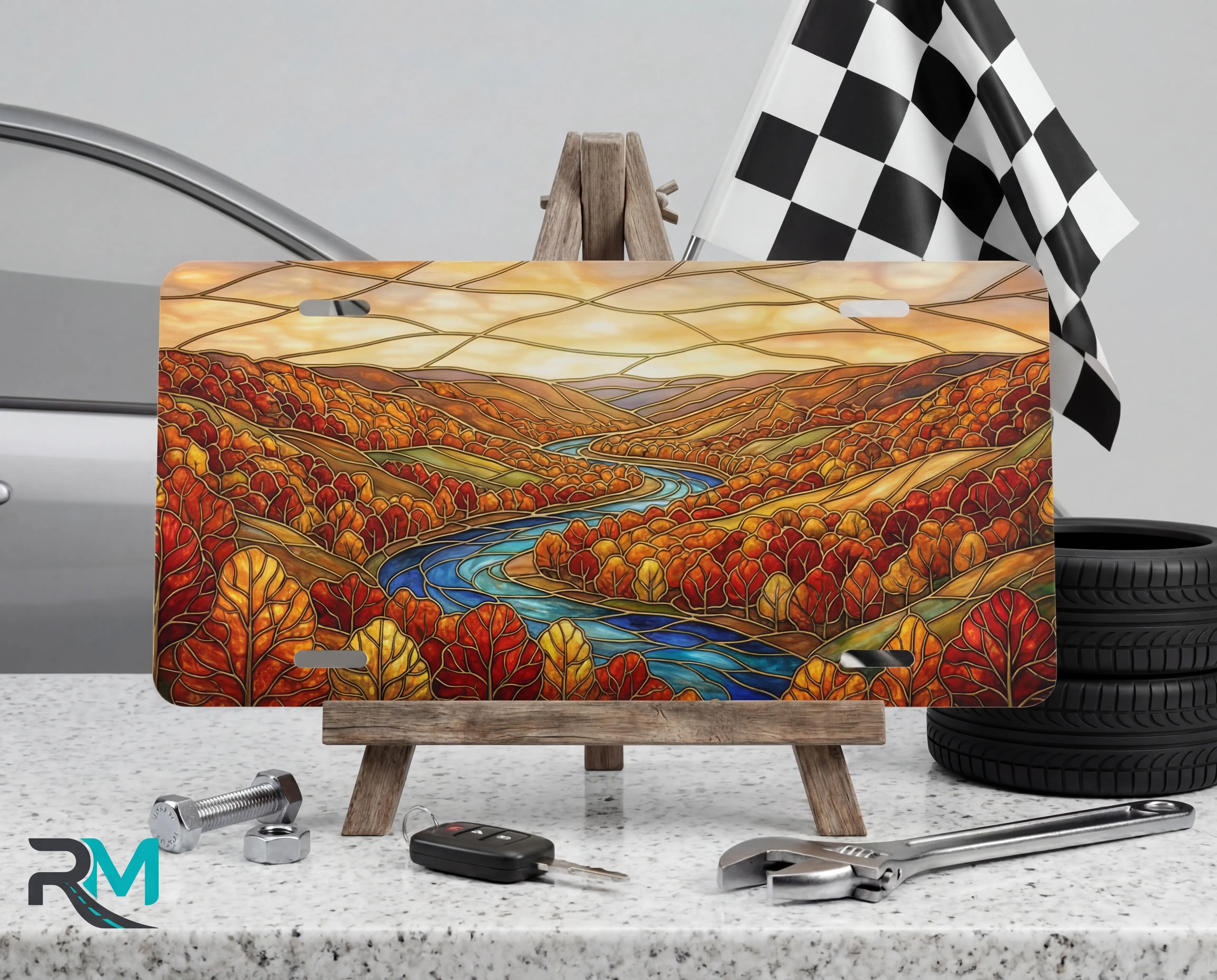 autumn river landscape vanity plate on tire — rich autumn red gold winding river fall front license plate