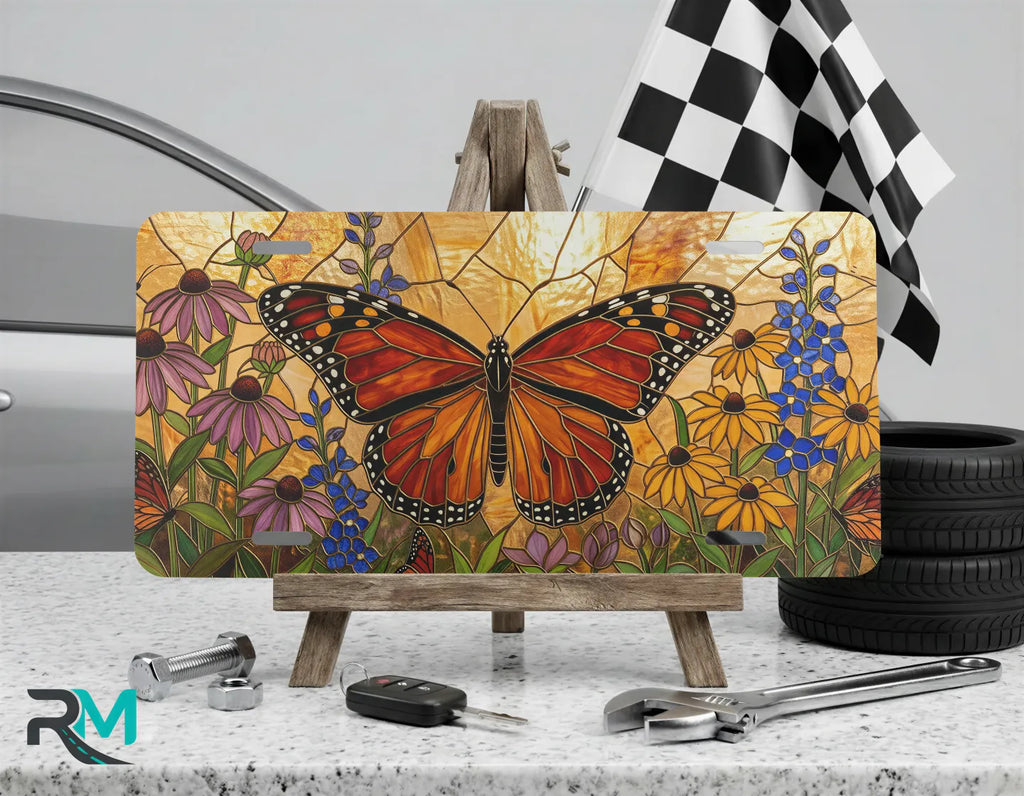 monarch butterfly floral vanity plate on display stand — orange butterfly wildflower aluminum plate