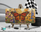 monarch butterfly floral vanity plate on display stand — orange butterfly wildflower aluminum plate