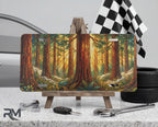 redwood forest vanity plate on display stand — warm amber golden light redwood trunks aluminum plate