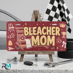 bleacher mom vanity plate on display stand — warm maroon chair megaphone aluminum plate