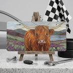 highland cow vanity plate on display stand — shaggy cow lavender hills aluminum plate