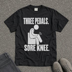 Three Pedals Sore Knee Driving Joke Tee - Road Muse