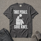 Three Pedals Sore Knee Driving Joke Tee - Road Muse