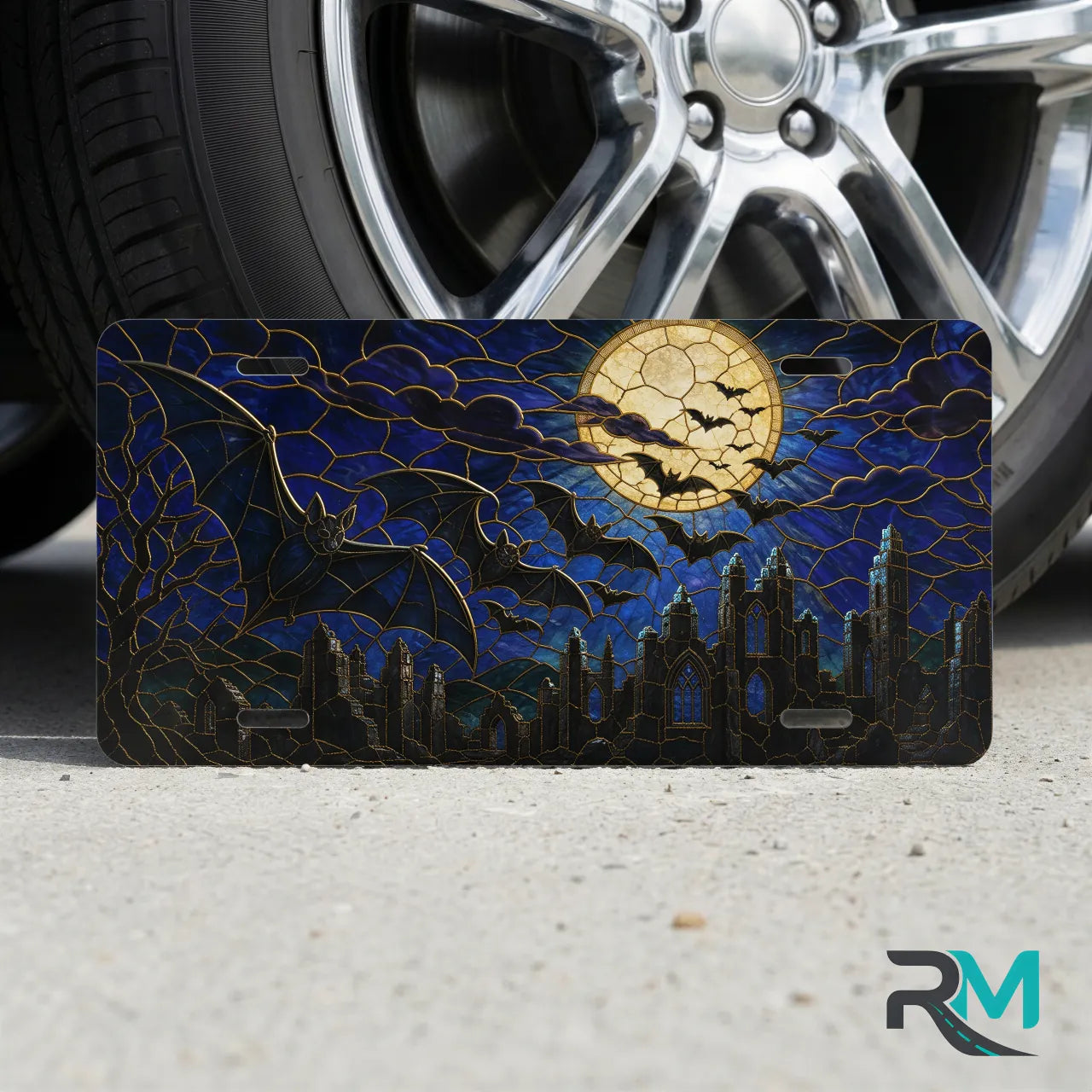 full moon bats vanity plate on tire — midnight blue bat cracked moon gothic front license plate