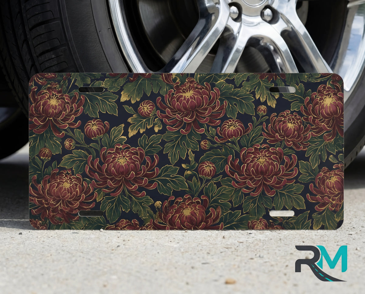 vintage floral chrysanthemum vanity plate close up — deep burgundy chrysanthemums lush green antique botanical detail
