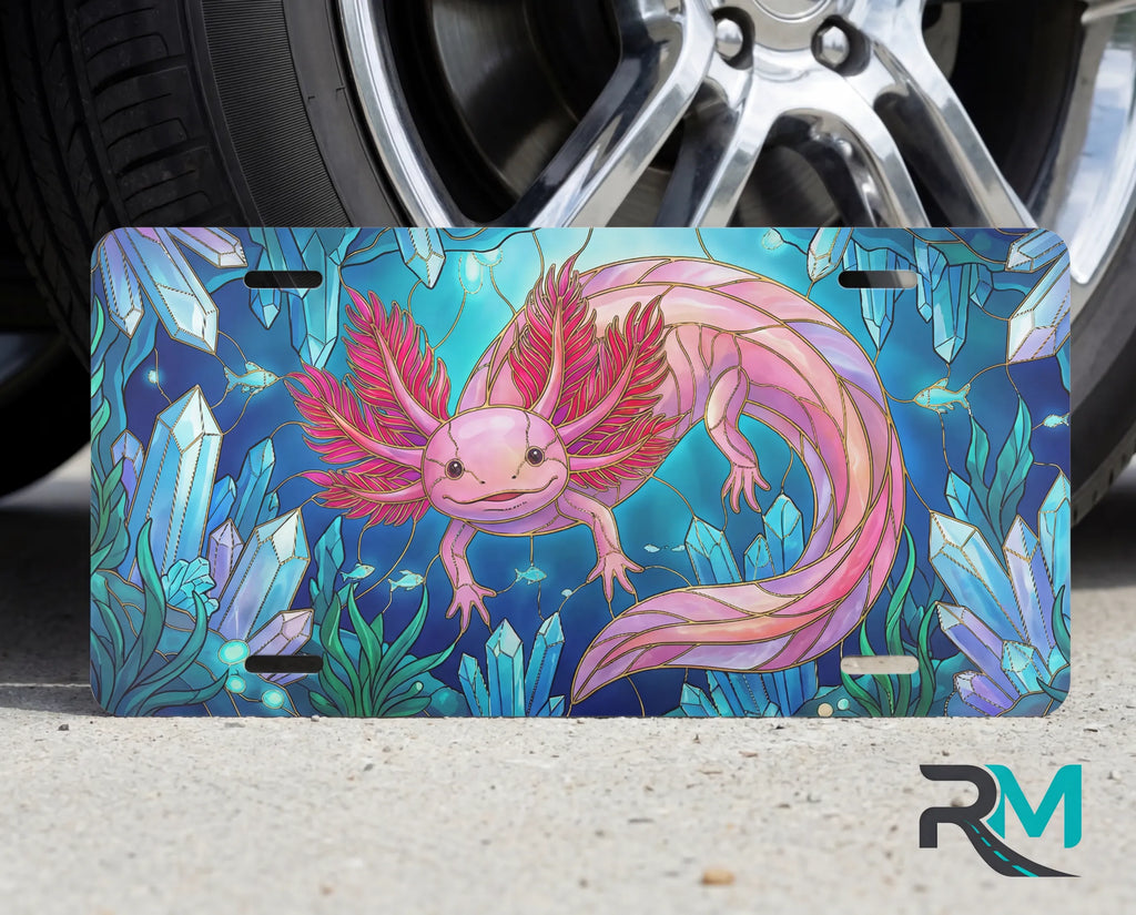 stained glass animal vanity plate on tire — vivid jewel tone wildlife front license plate