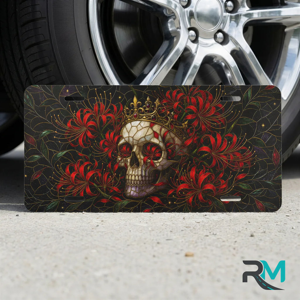 skull crown vanity plate on tire — jewel red crowned skull chrysanthemum front license plate