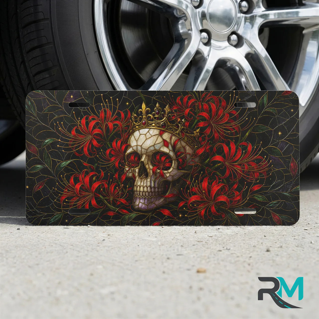 skull crown vanity plate on tire — jewel red crowned skull chrysanthemum front license plate