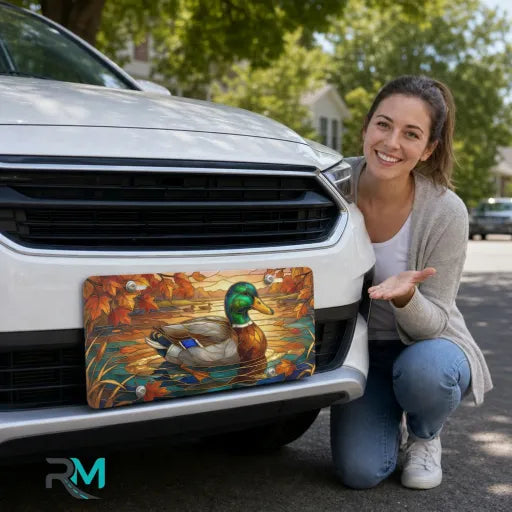 woman with mallard duck vanity plate — emerald mallard autumn amber pond front license plate
