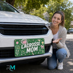 woman with lacrosse mom vanity plate — green pink lacrosse sticks front license plate