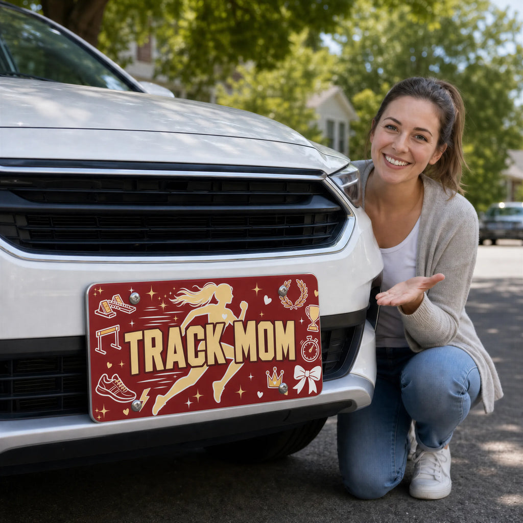 woman with track mom vanity plate — runner silhouette TRACK MOM front license plate