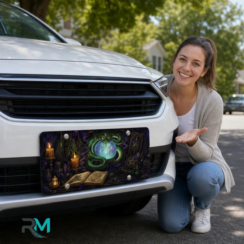 woman with green serpent crystal ball vanity plate — jewel green serpent orb front license plate