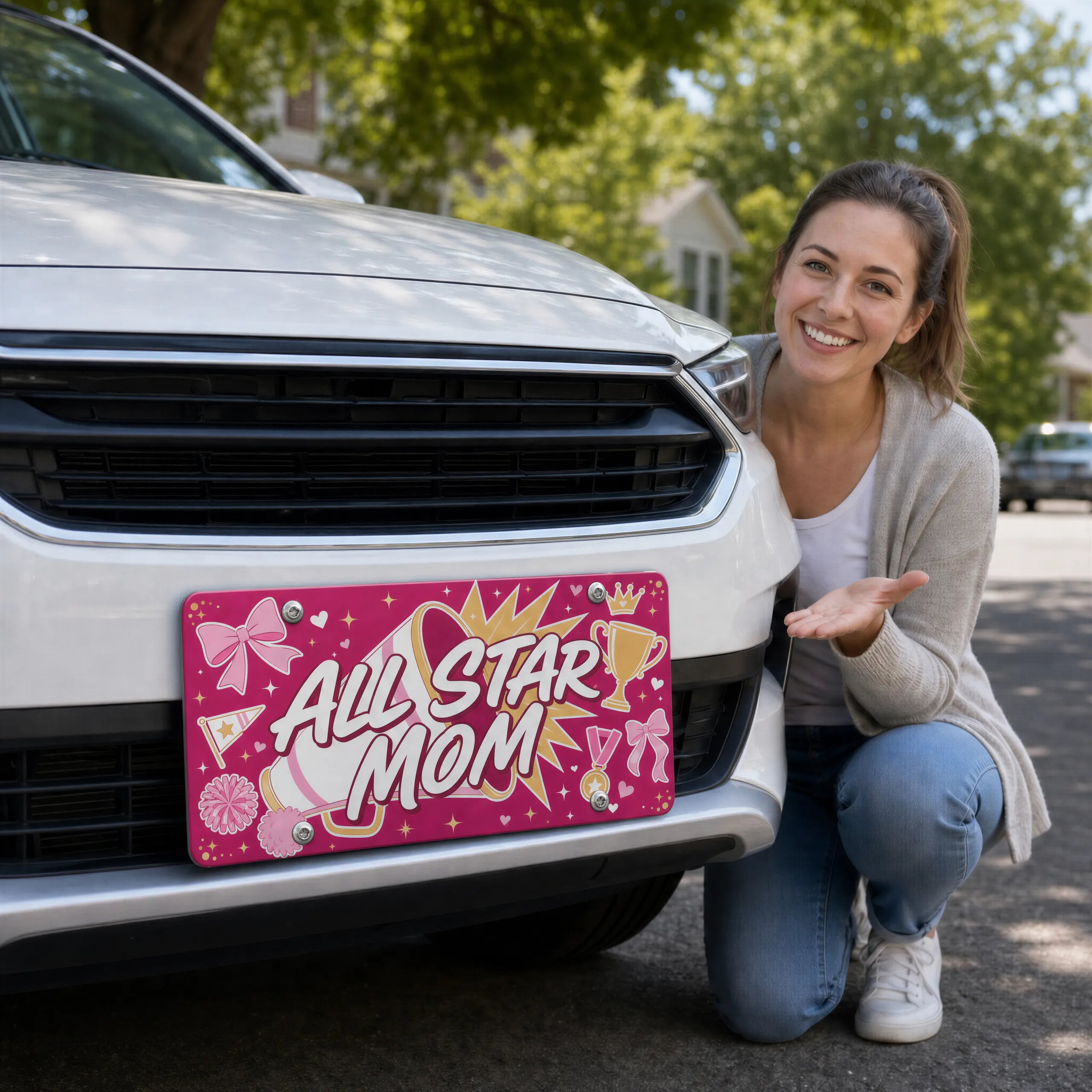 woman with all star mom vanity plate — hot pink megaphone front license plate
